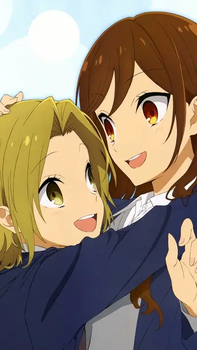 Two girls hugging, smiling happily