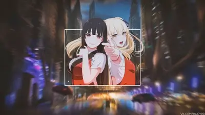 Two girls in a city at night