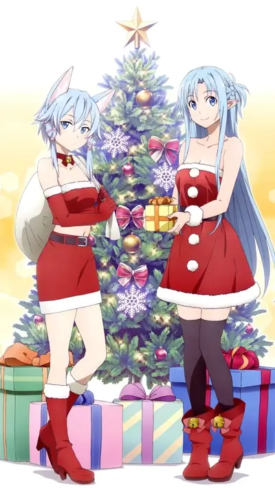 Two girls in Christmas costumes near a Christmas tree
