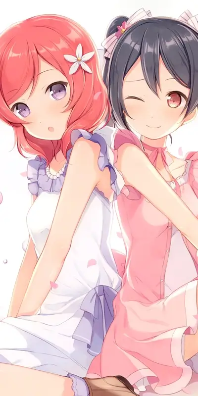 Two girls in summer dresses, close together