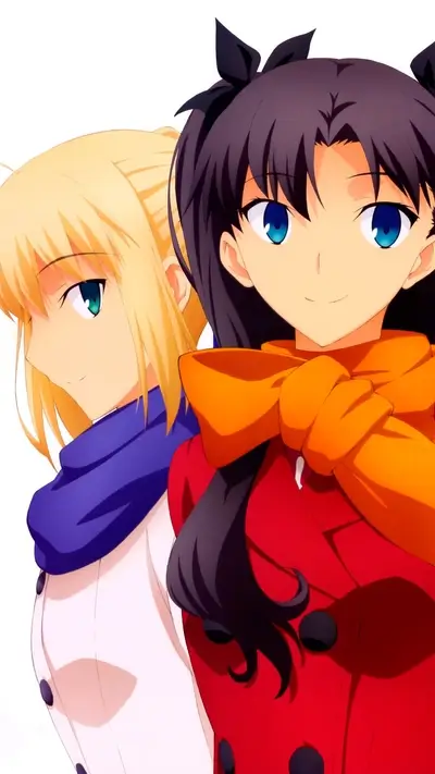 Two girls in winter clothes, one blonde, one with dark hair