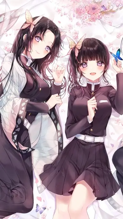 Two girls lying down with butterfly hair accessories