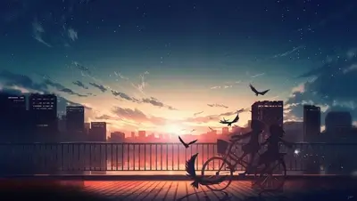 Two girls on a bicycle at sunset