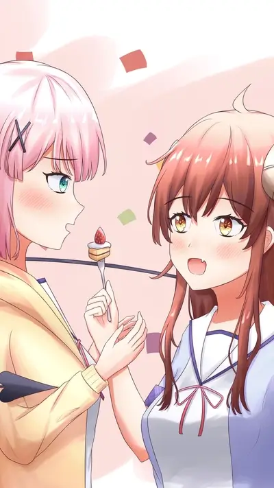 Two girls sharing a cake