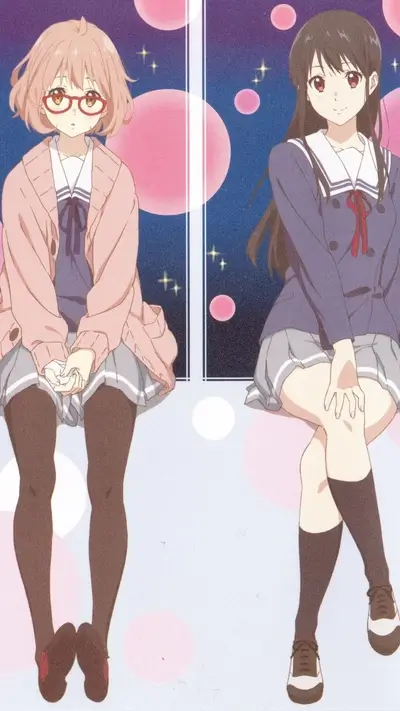Two girls sitting side by side