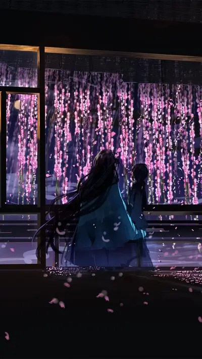 Two girls watching wisteria flowers at night