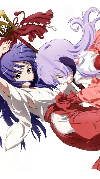 Two women in miko attire holding a magical staff