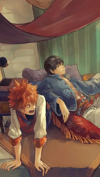 Two young men relaxing on a divan