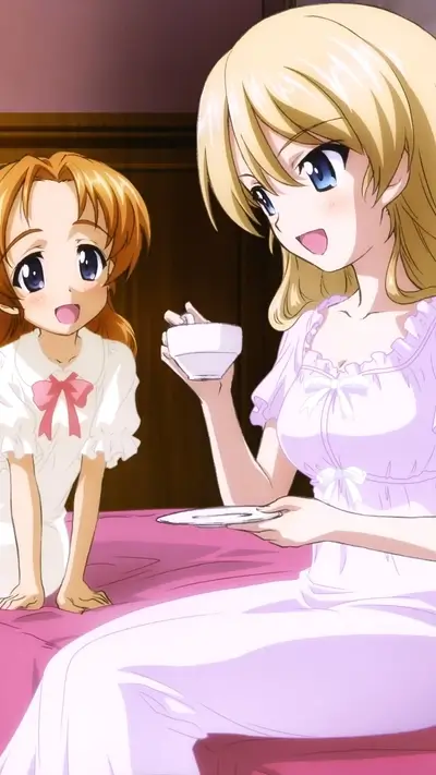 Two young women enjoying tea, seated