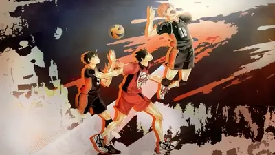 Volleyball players mid-game action