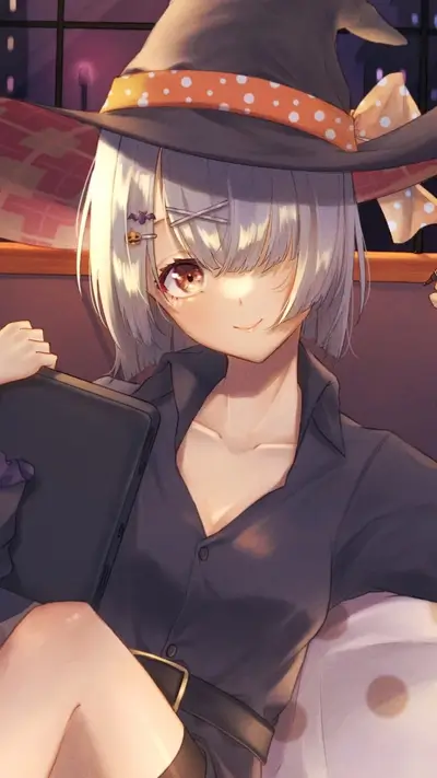 Witch girl using a tablet