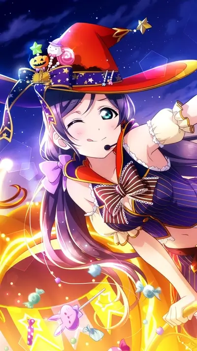 Witch girl with candy in a Halloween costume