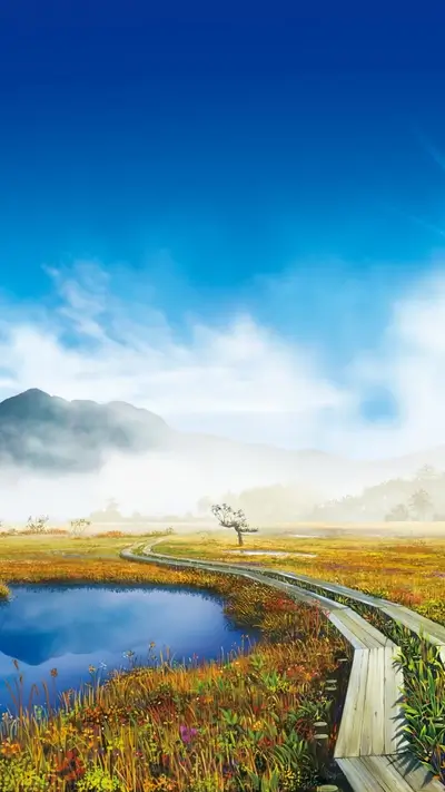 Wood boardwalk curves across marshlands, blue pond reflects sky, mist hides mountain backdrop