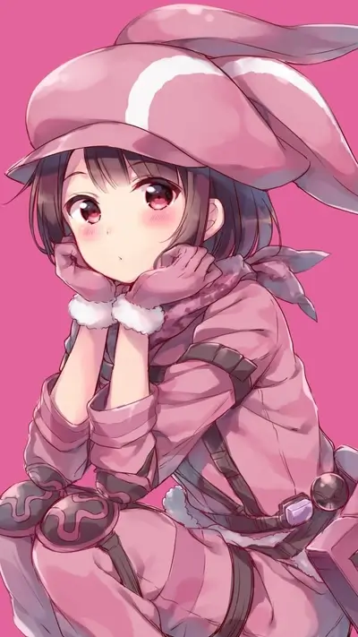 Young girl with brown hair wearing bunny hat and pink outfit