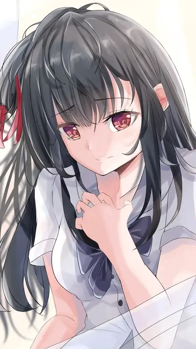 Young woman with dark hair, wearing a school uniform